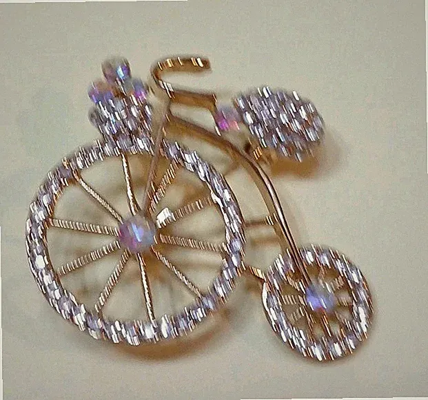 VINTAGE Gold Tone bicycle with clear rhinestones brooch